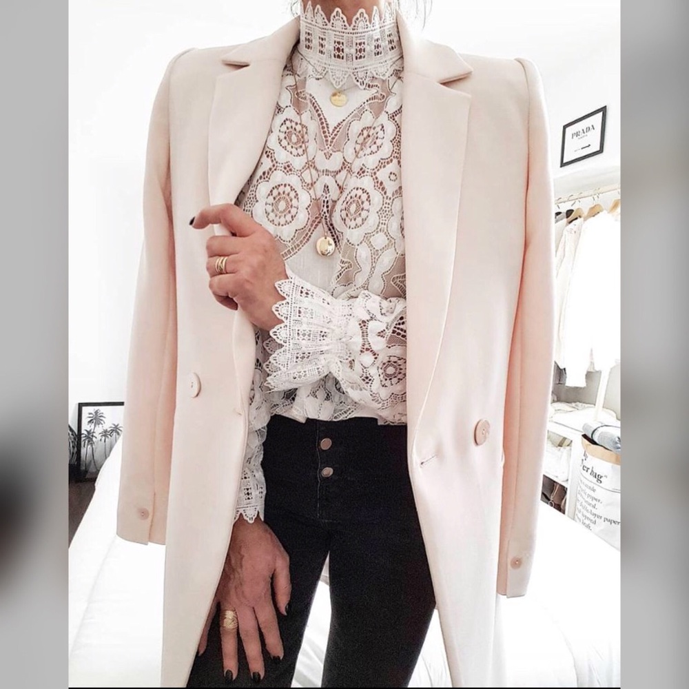 Women’s sheer white lace runway style top